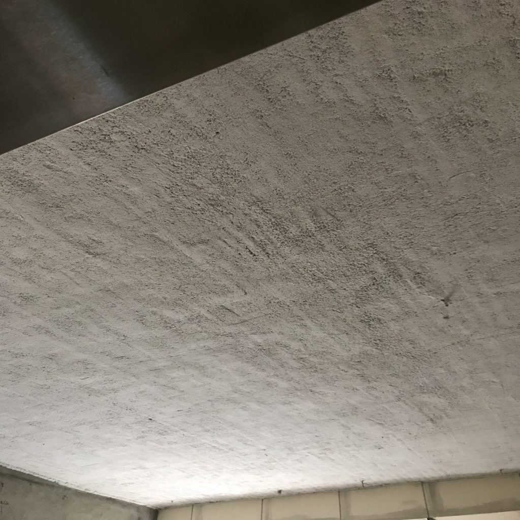 Protection structurelle par flocage fibreux