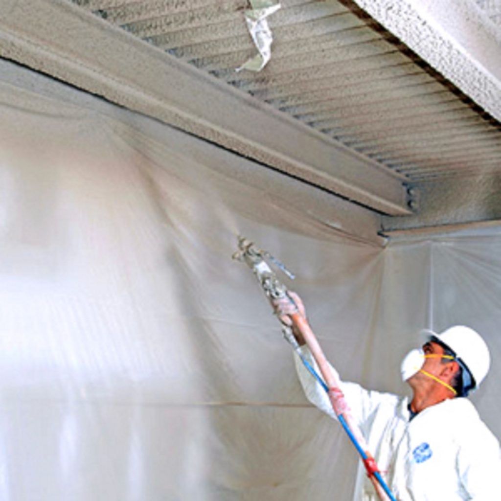 Flocage isolant pour locaux techniques